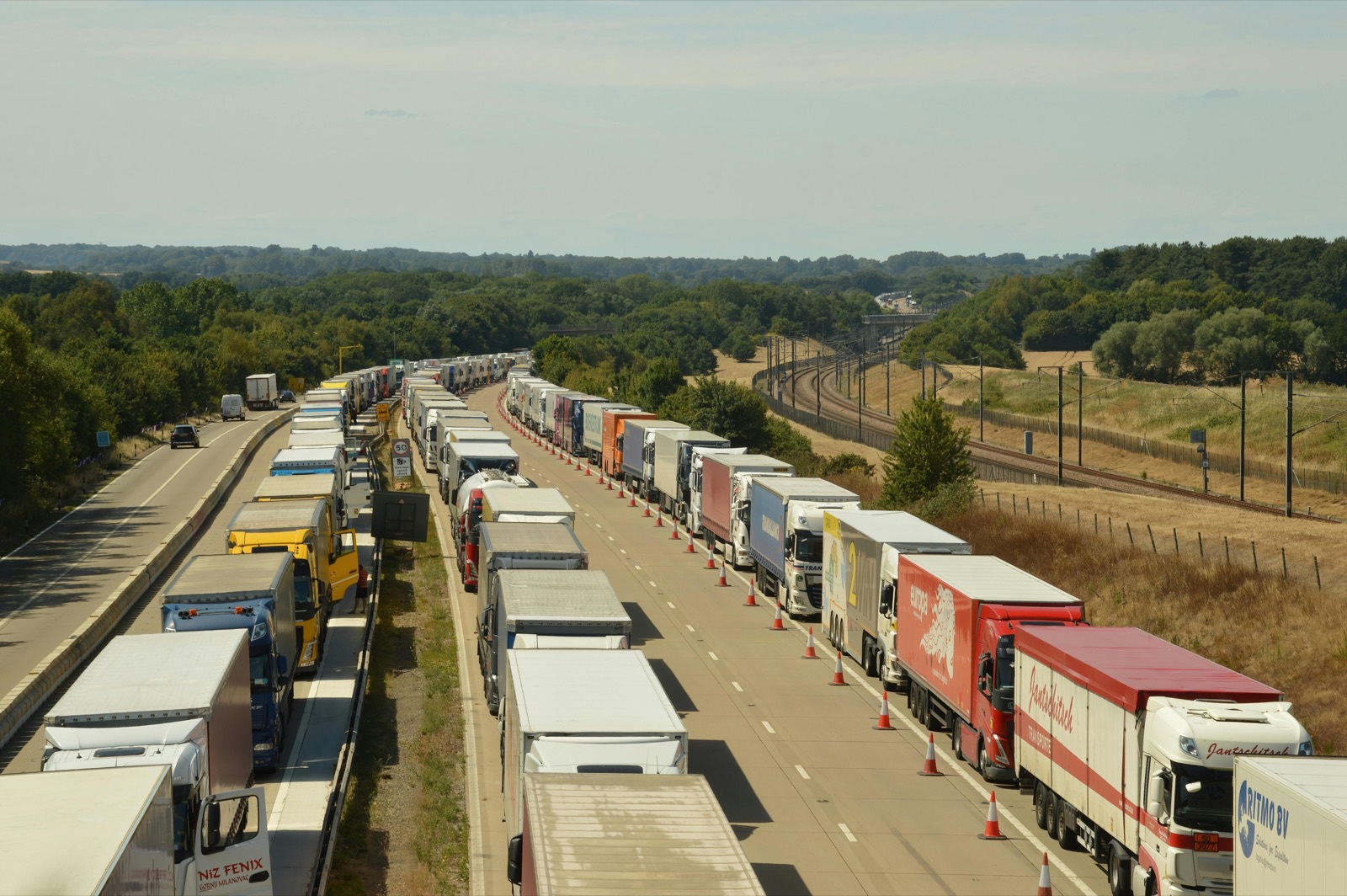 Long-haul trucks parked at a regional logistics depot in East Africa